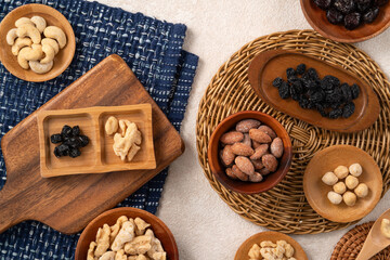 Flavored mixed nuts in bowls.