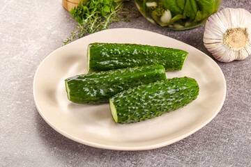Homemade lighty salted cucumbers with herbs