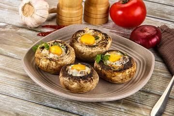 Baked champignon with quail egg