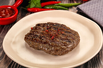 Grilled beef burger cutlet with sauce