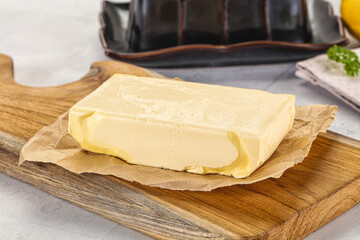 Dairy butter piece over board