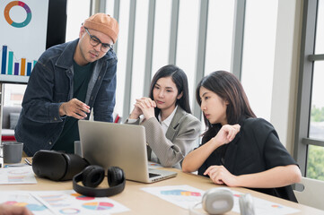 Businessman, Asian man and woman The meeting was tense. Brainstorm and talk about analysis, innovation, and collaboration. online business Modern sales techniques and strategic planning