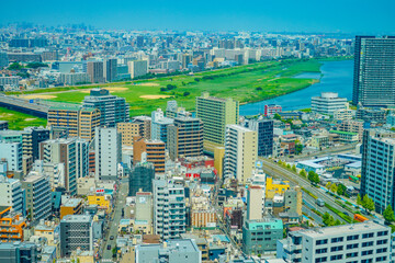 川崎市の住宅地と河川 © kanzilyou