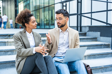 Professional occupation, office workers. Business people meet before staff meeting and presentation...