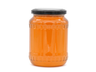 Jar of organic raw polyfloral honey isolated on white