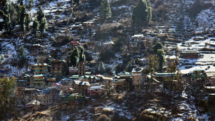 SNOW COVERED VILLAGE.
