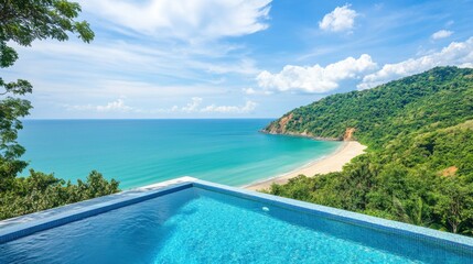 Luxury rooftop infinity edge pool overlooking a tropical beach.