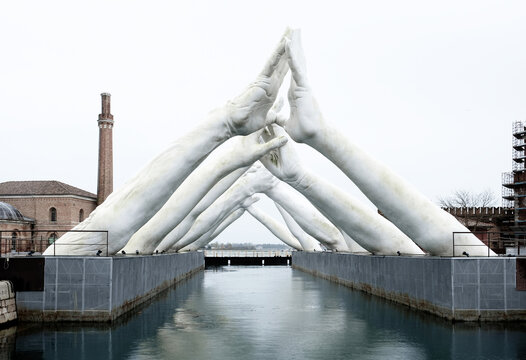 Venice, Italy - March 26, 2024: Building Bridges, monumental installation of contemporary Italian artist Lorenzo Quinn.