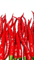 Red hot chili peppers on white background