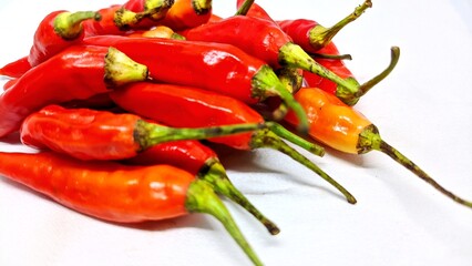 Cayenne pepper arranged on white background