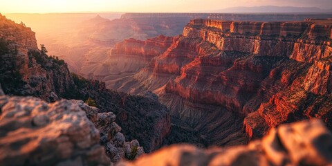 Fototapeta premium Sunrise illuminating the majestic grand canyon in arizona, usa
