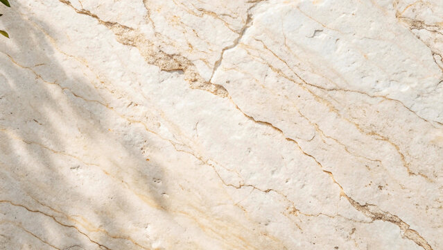 Warm white rough grainy natural stone texture background with subtle shadows and organic patterns, ideal for minimalist design, rustic themes, orconcrete, dirty, tile, cement, cracked, wallpaper, beig