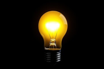Bright yellow light bulb glowing against a dark background, symbolizing ideas and innovation in design and technology