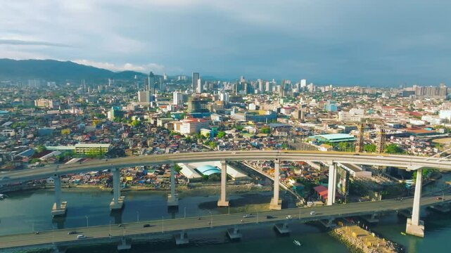 4K Aerial Perspective Cebu Cordova Bridge, Philippines.
Cebu-Cordova Link Expressway, a modern engineering marvel connecting Cebu Island and Mactan Island in the Philippines