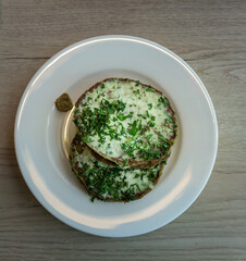Plate of food with two pieces of food on it