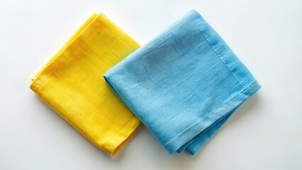 Double exposure: blue and yellow napkins, top view, textured fabric, white background, food styling.