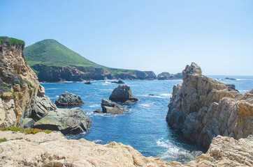 Coastal landscape with rocky formations and clear water, Big Sur Coastline, California, USA