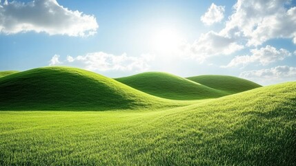 Obraz premium Green grassy hills under a bright blue sky with clouds