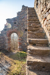 Fototapeta premium Old fortress ruins near chapel in a small czech town Petrohrad. Way of pilgrims, Czech republic.