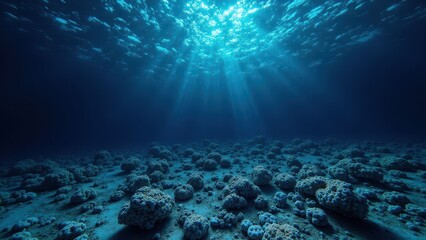 Deep underwater coral reef with sunlight rays penetrating the ocean depths	