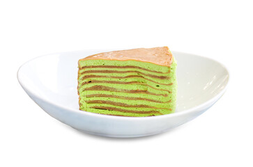 green tea crepe cake on a white plate