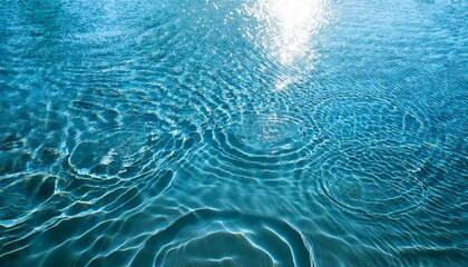 Obraz na płótnie Canvas water background water surface texture wave in bathroom top view swimming pool with natural sunlight on abstract circle pattern for spa cosmetic serum banner background summer blue sea beach