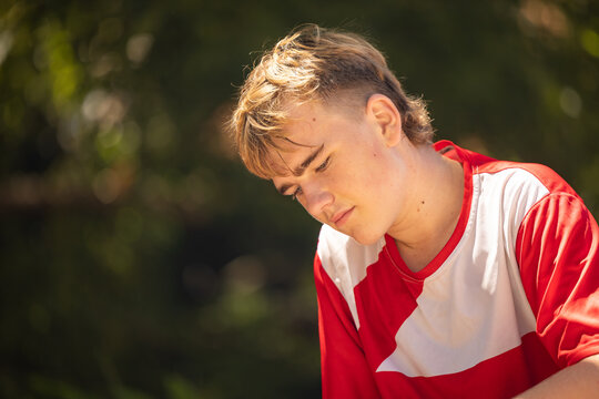 Close up portrait of teenage boy with serious expression