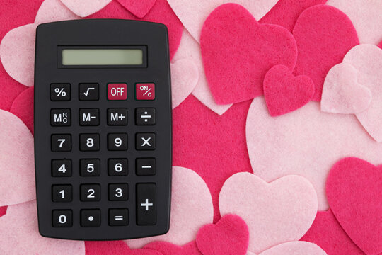 Calculator on pink hearts celebrating love for math - Powered by Adobe
