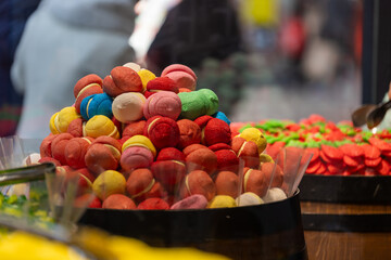 Colorful Sugar-Coated Round Candies in a Candy Store Display