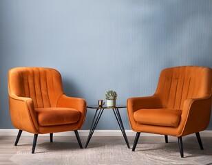 two orange chairs facing each other near a small table