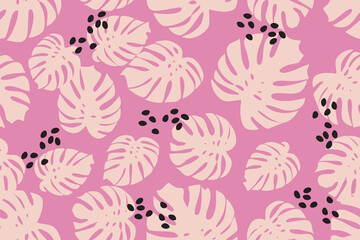 Tropical monstera leaves in soft pink background pattern design