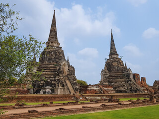 Ornate stupas dominating skyline of wat phra sri sanphet, historic buddhist temple complex...
