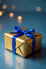 Gold and blue wrapped Hanukkah gift on a plain metal table, holiday, presentation, festive