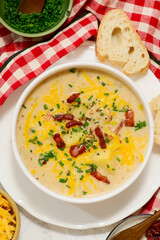 Cheeseburger Soup with Cheddar Cheese and Bacon.style rustic