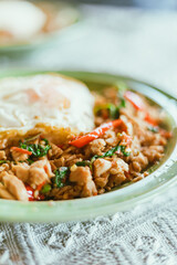 Stir Fried Basil Chicken , Fried Egg with Rice