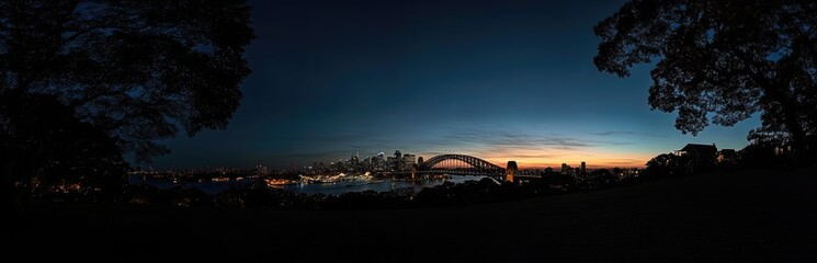 Fototapeta premium Panoramic view of city skyline Bridge at night, clear sky, no clouds, no buildings in front of or near the bridge, no reflections on the water surface, sharp focus