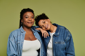 Naklejka premium Stylish lesbian couple radiating love and positivity against a vibrant backdrop