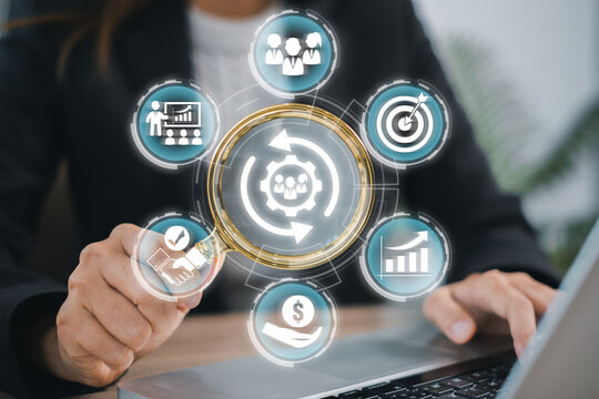 Digital interface illustrating human resource management with business icons, symbolizing modern workplace efficiency and strategy.