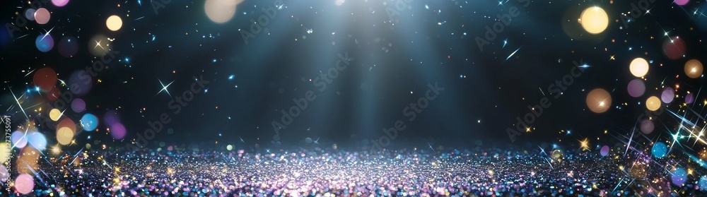 Poster a dynamic atmosphere is created in an empty performance space by the colorful stage lights that shin