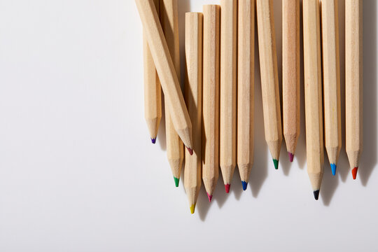 Colorful pencils on white background