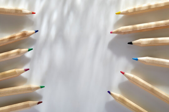 Colorful pencils on white background