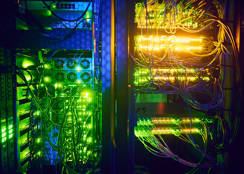 Close-up&nbsp;of hard drives and cables in data center