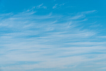 blue sky with some long wispy clouds