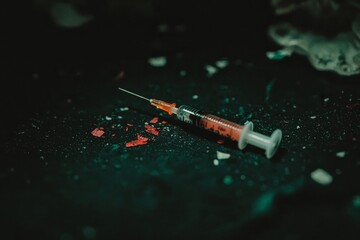 A close-up shot of a syringe with a needle inserted, providing a detailed view of its design and functionality, Detailed close up of a hypodermic needle, AI Generated