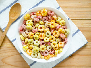 Colorful fruity breakfast cereal in a bowl