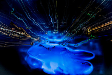 Abstract long exposure zoom Effect, experimental surreal photo of A Swimming Pool lights at night