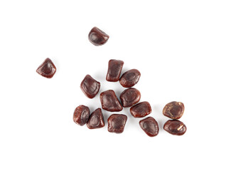 Dried tamarind seeds isolated, Tamarindus indica beans on a white background, medicine ingredient