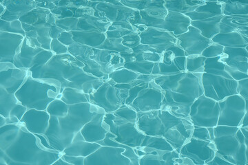 Blue water in swimming pool background