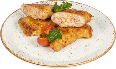 A pristine white plate generously topped with fried meat and ripe tomatoes
