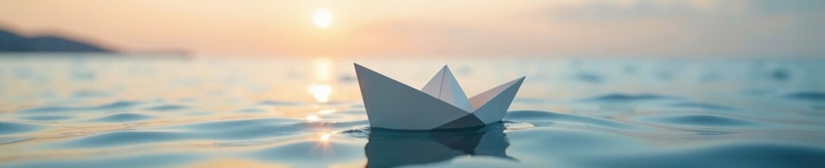 Obraz premium A fragile paper boat is carried by the breeze across the calm sea, soft, peaceful